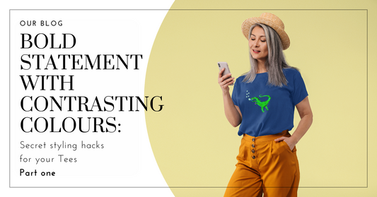 Lady wearing an organic cotton t shirt whilst looking at her phone