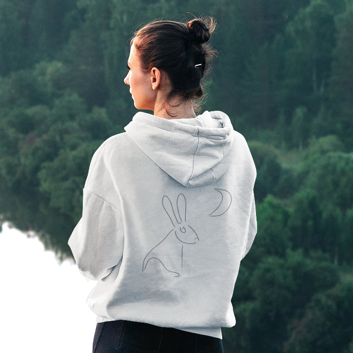 Hare Stares at Moon | Sustainable Hoodie worn by a woman