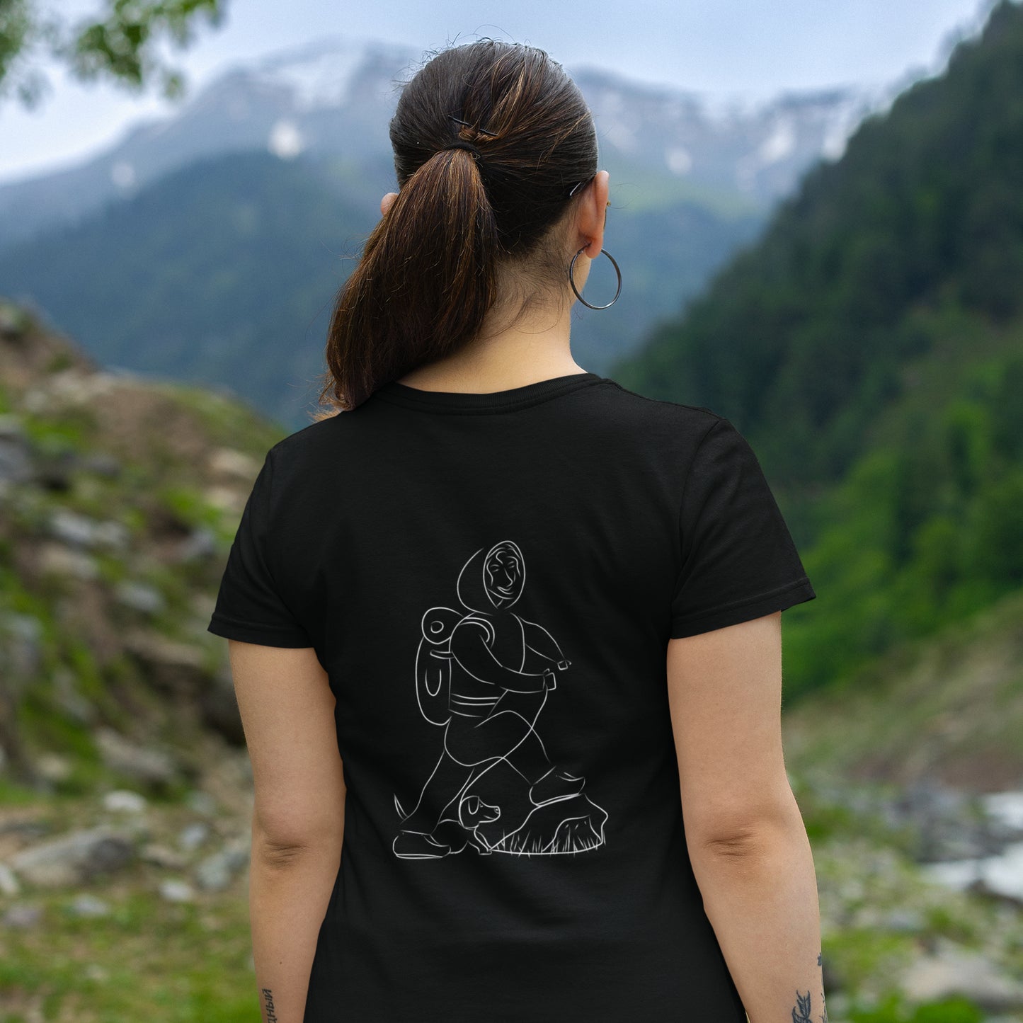 Woman and Dog Hiking White | 100% Organic Cotton T Shirt worn by a woman