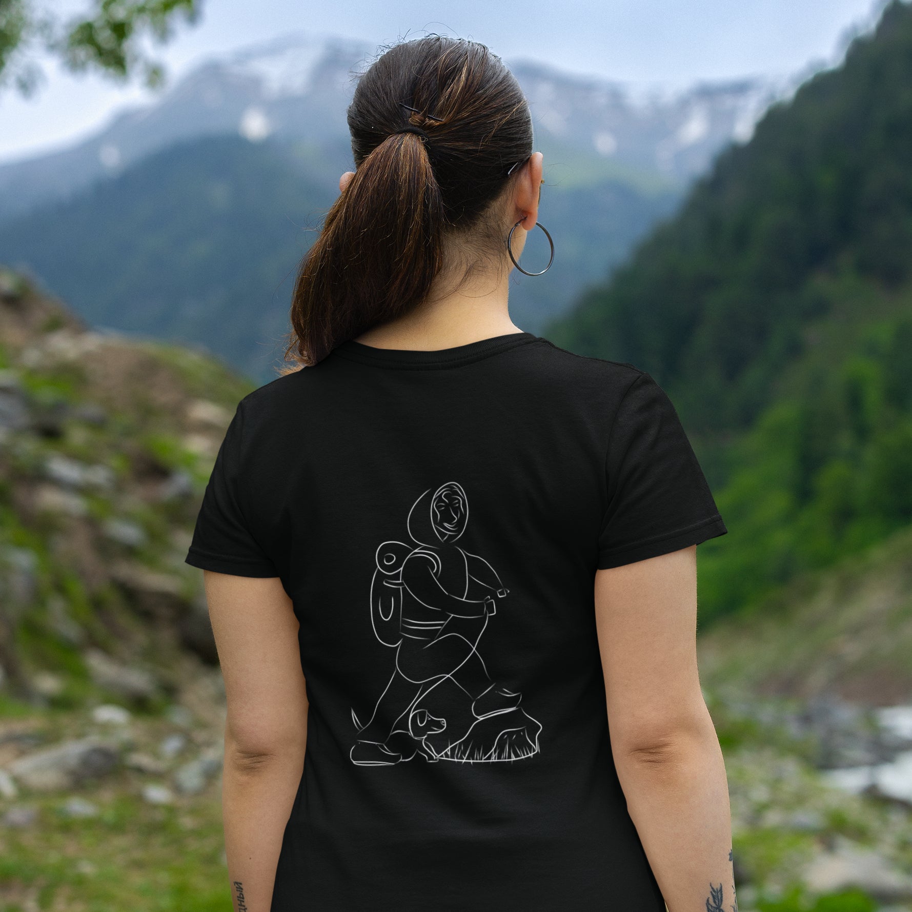 Woman and Dog Hiking White | 100% Organic Cotton T Shirt worn by a woman
