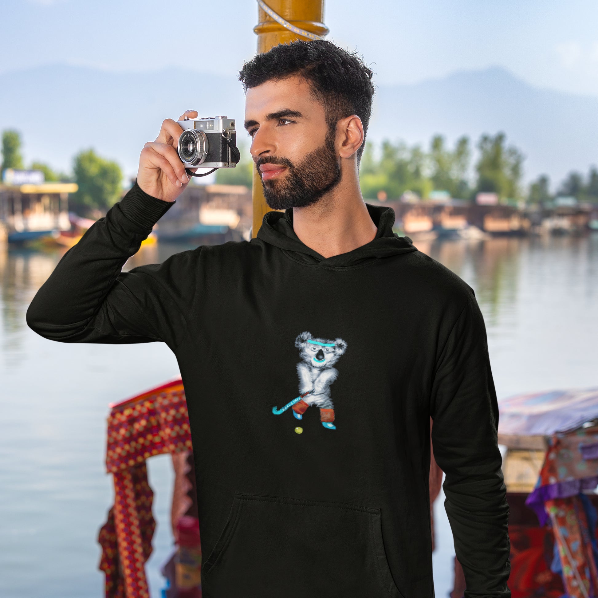 Koala Playing Hockey | Sustainable Hoodie worn by a man