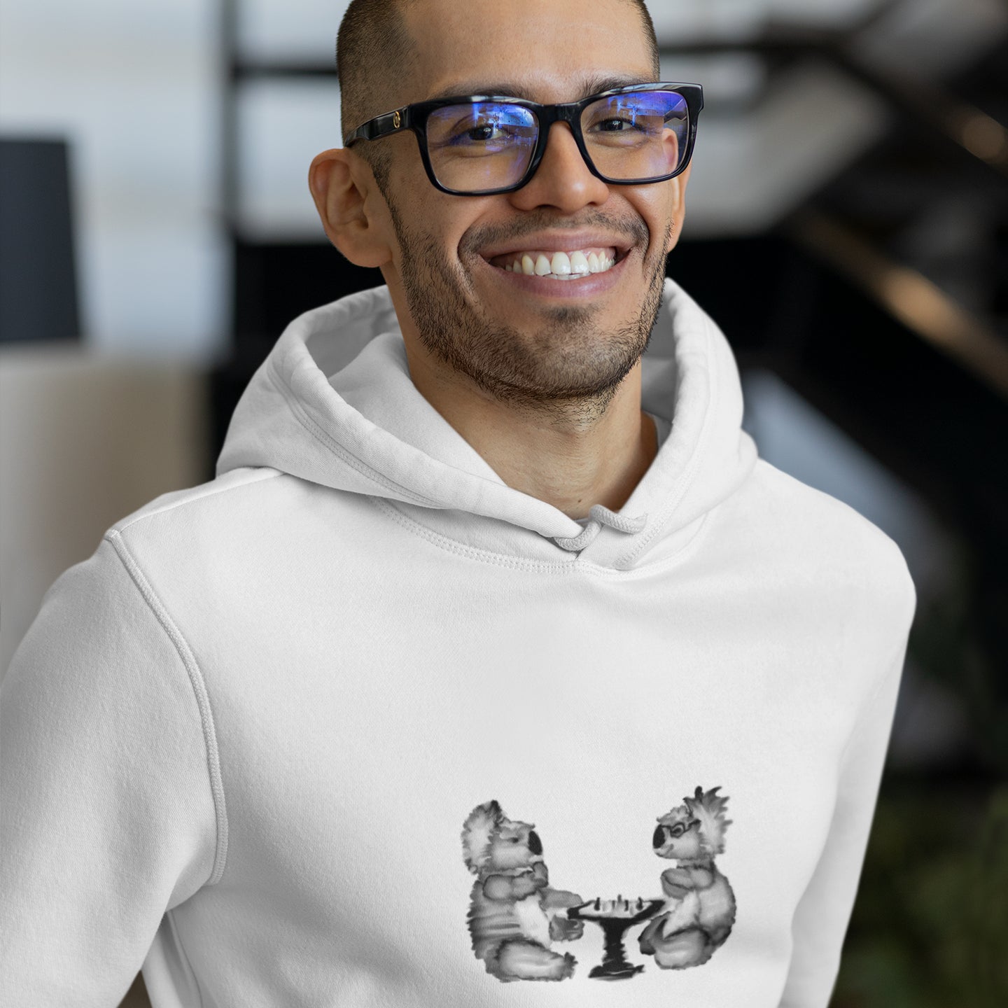 Koalas Playing Chess | Sustainable Hoodie worn by a man