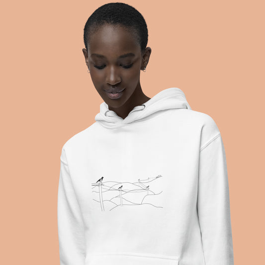 Magpies | Sustainable Hoodie worn by a woman