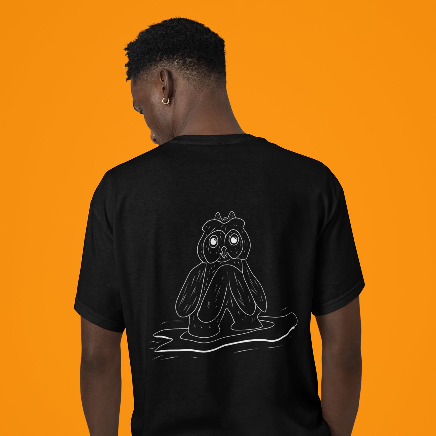 Surfing Owl White Line | 100% Organic Cotton T Shirt worn by a man
