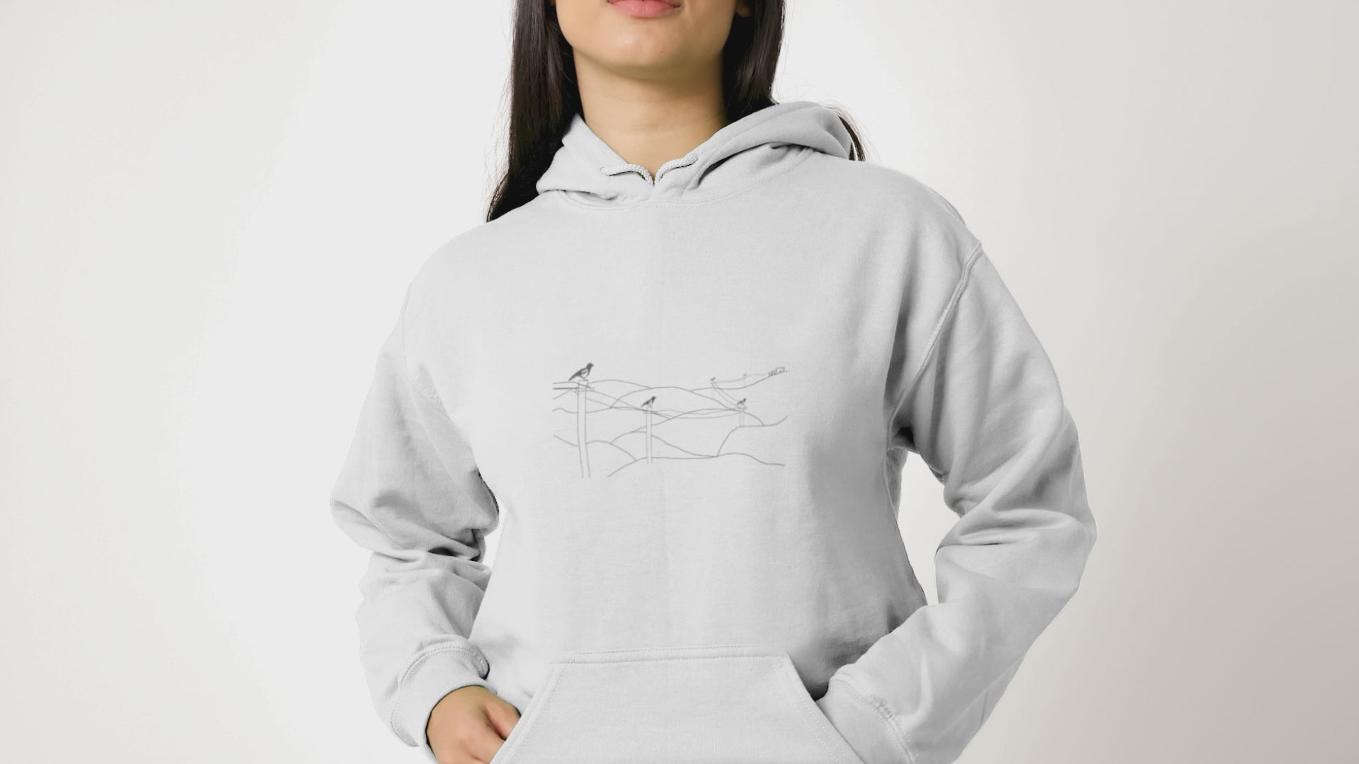 Magpies | Sustainable Hoodie worn by a woman