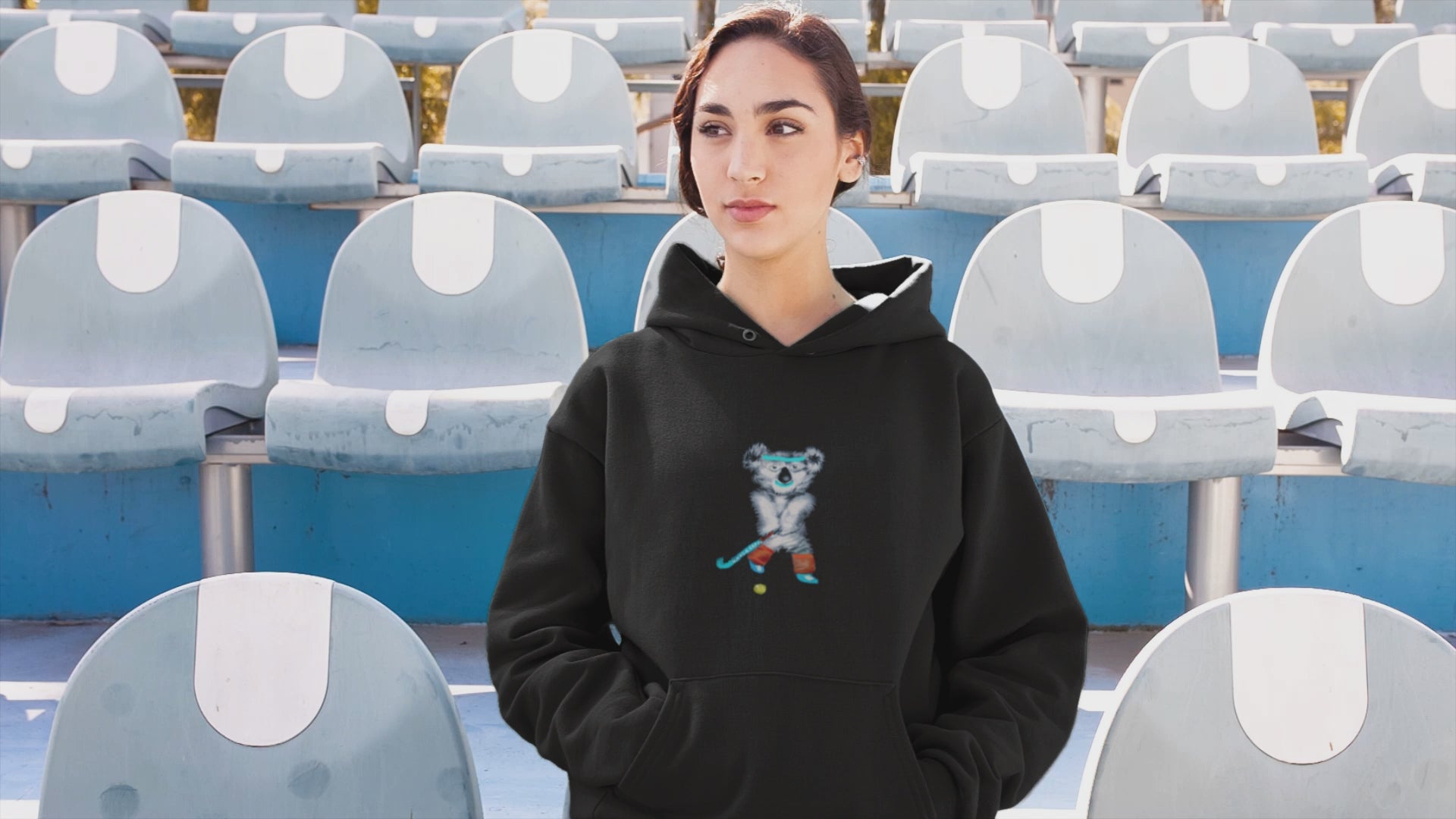 Koala Playing Hockey | Sustainable Hoodie worn by a woman