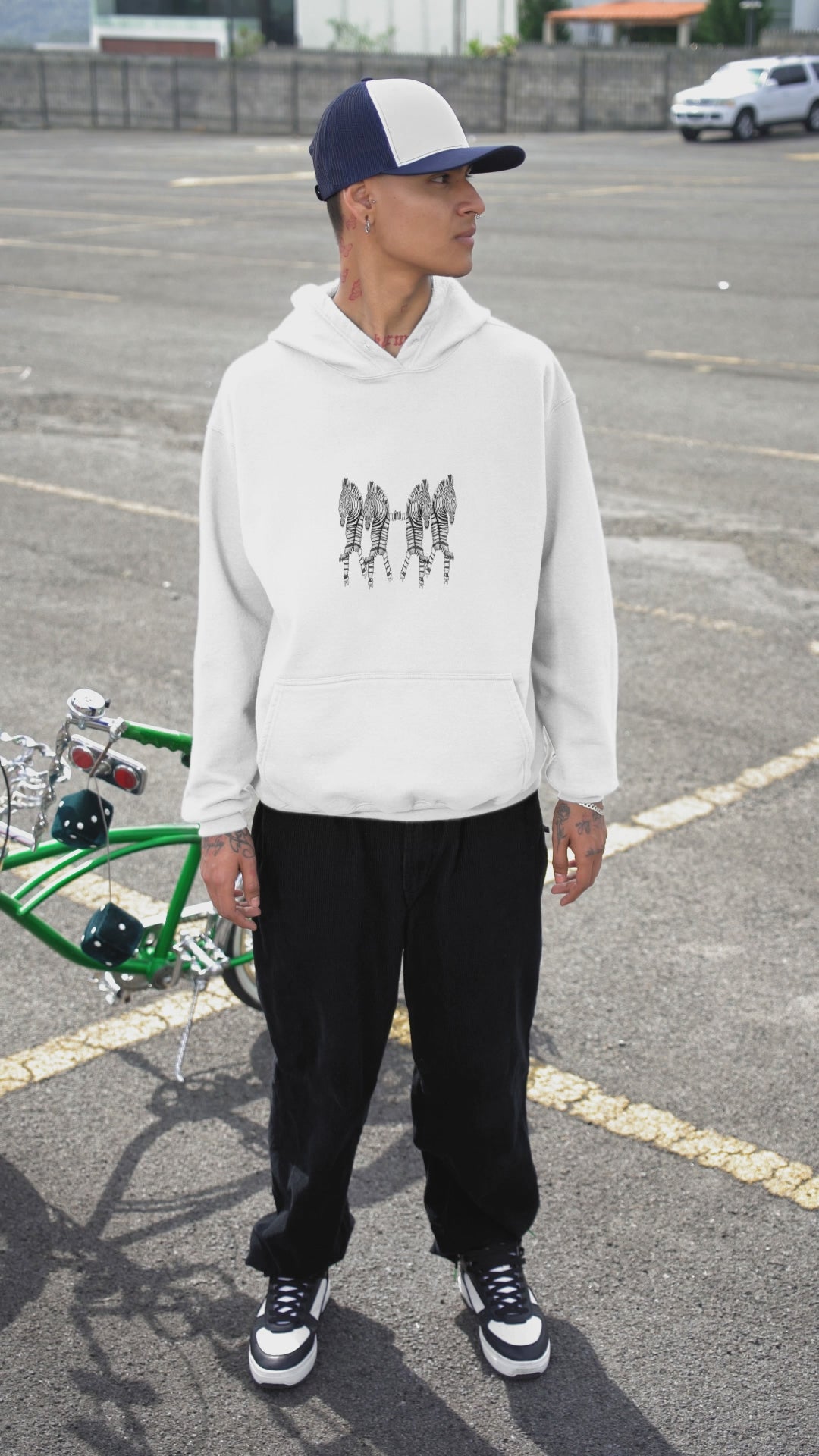 Roller Skating Zebras | Sustainable Hoodie worn by a man