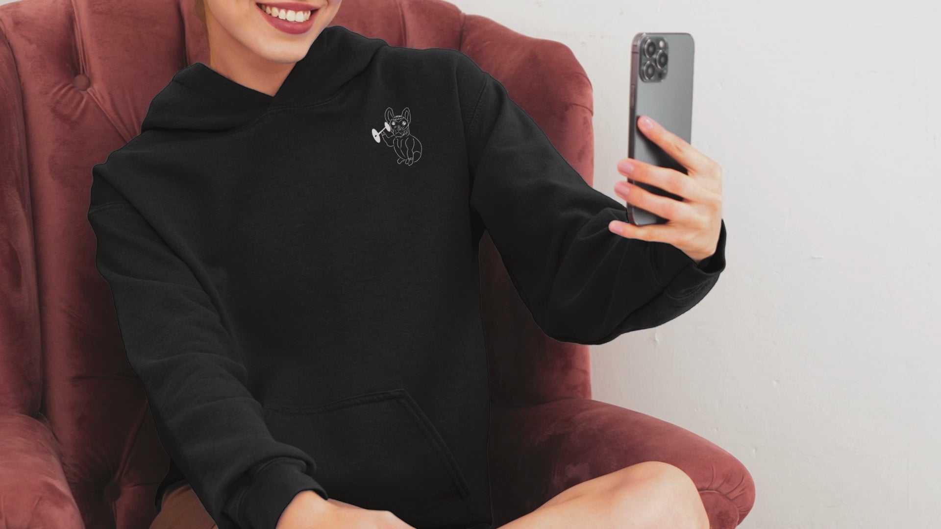White French Bulldog Weight Lifter | Sustainable Hoodie worn by a woman