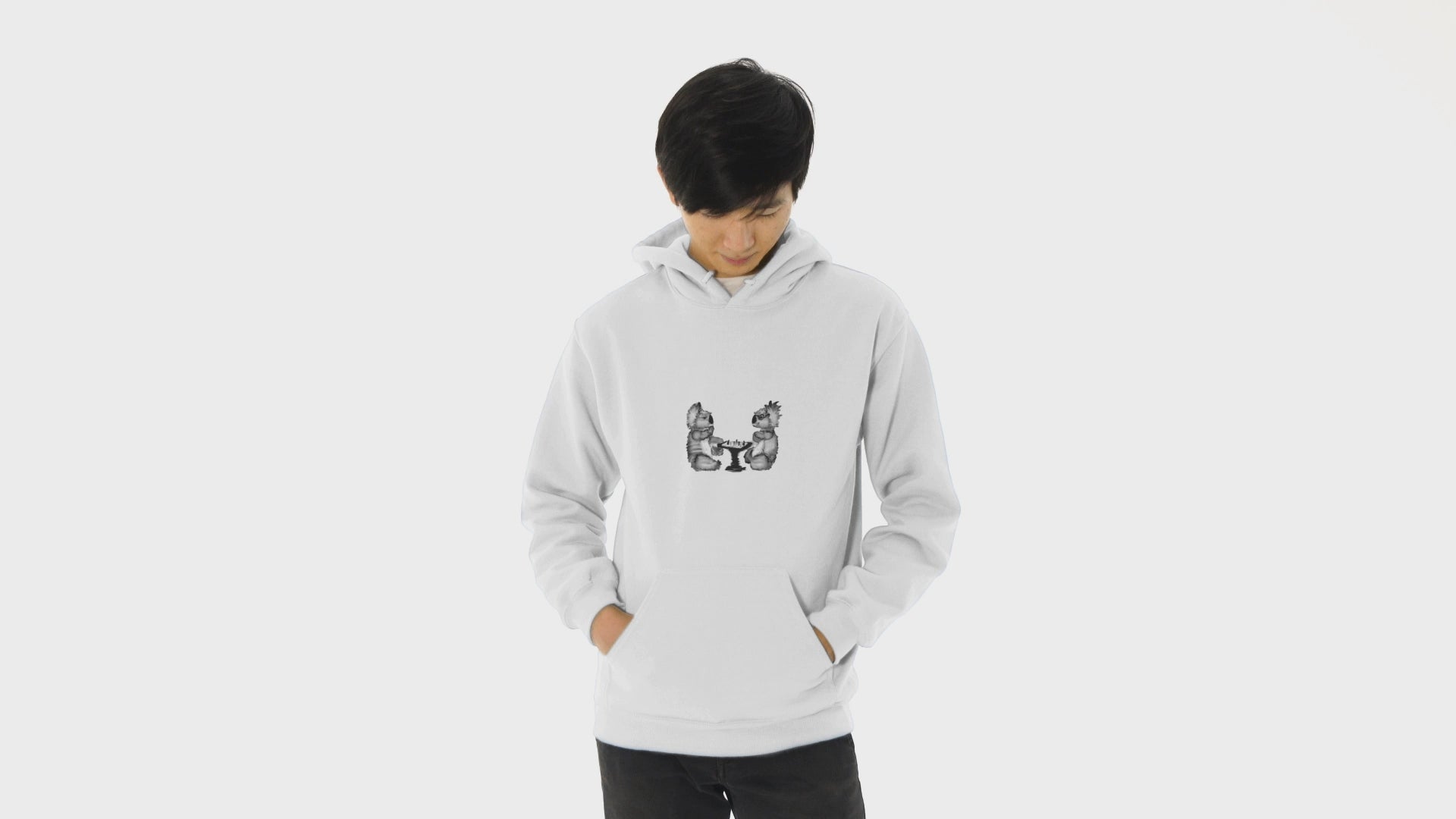 Koalas Playing Chess | Sustainable Hoodie worn by a man