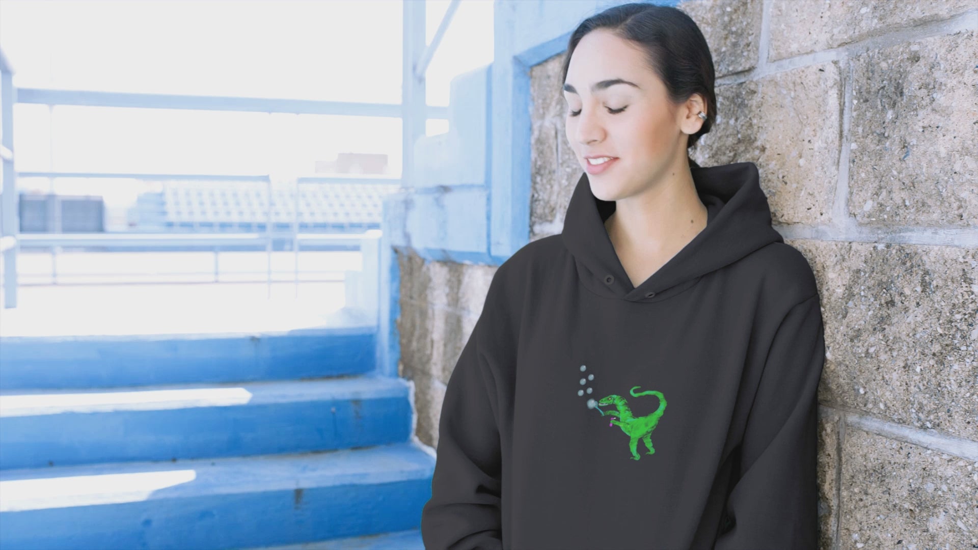 Dinosaur Velociraptor | Sustainable Hoodie worn by a woman