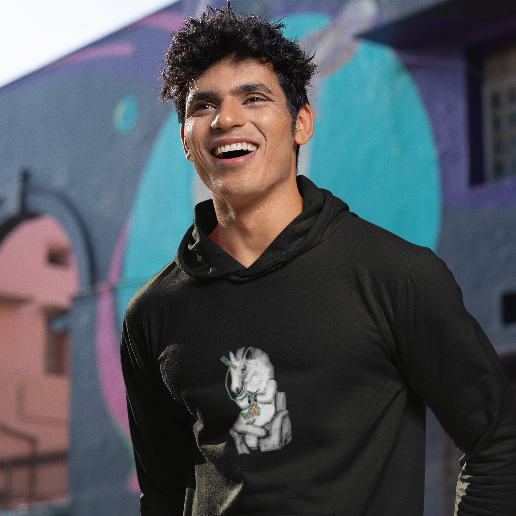 Knitting Unicorn | Sustainable Hoodie worn by a man