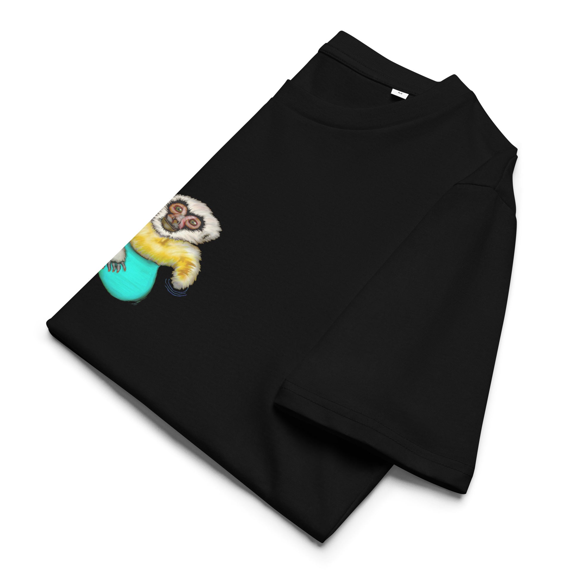 Gibbon Surfing | 100% Organic Cotton T Shirt in black folded