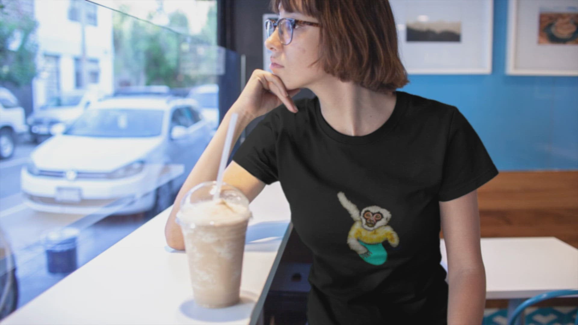 Gibbon Surfing | Women's 100% Organic Cotton T Shirt worn by woman in a cafe