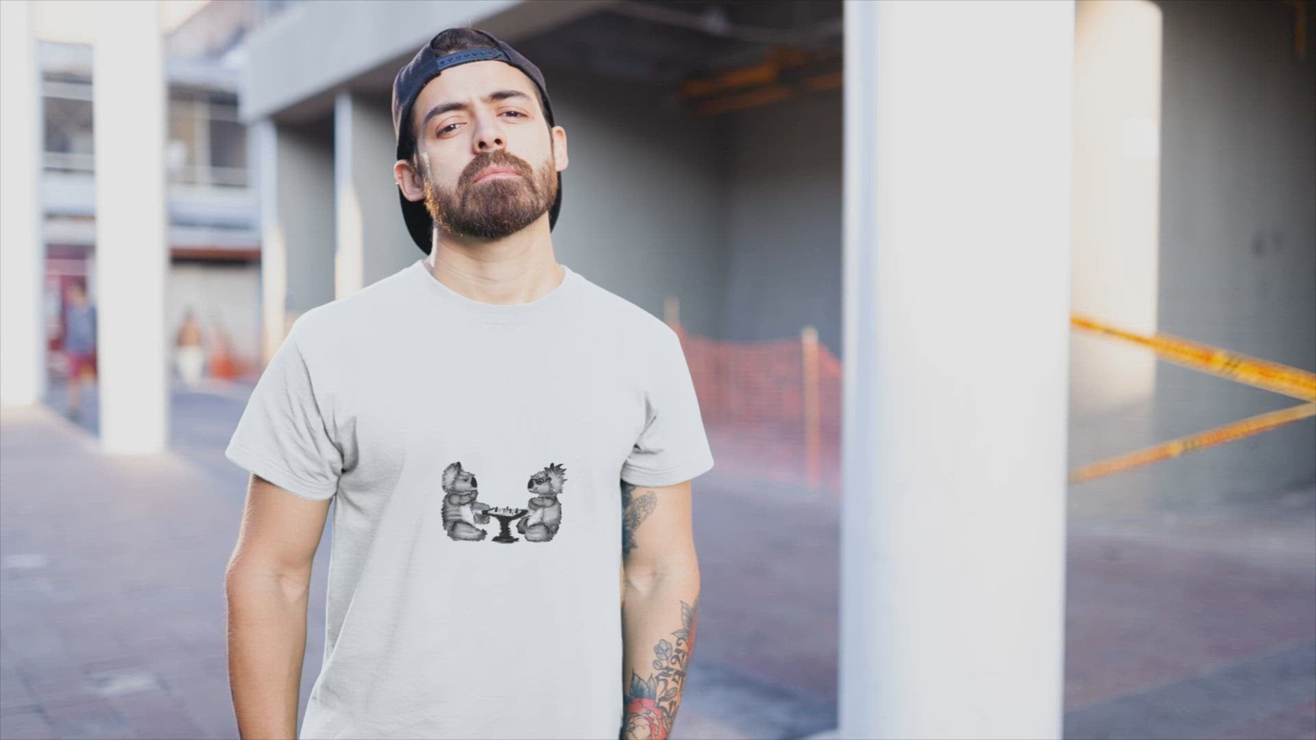 Koalas Playing Chess | 100% Organic Cotton T Shirt worn by a man on the street