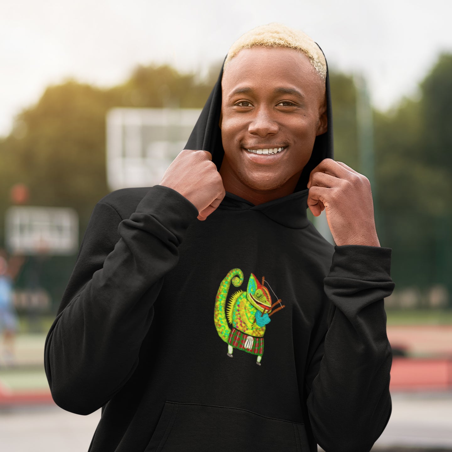 Man wearing a Chameleon bagpiper sustainable vegan hoodie