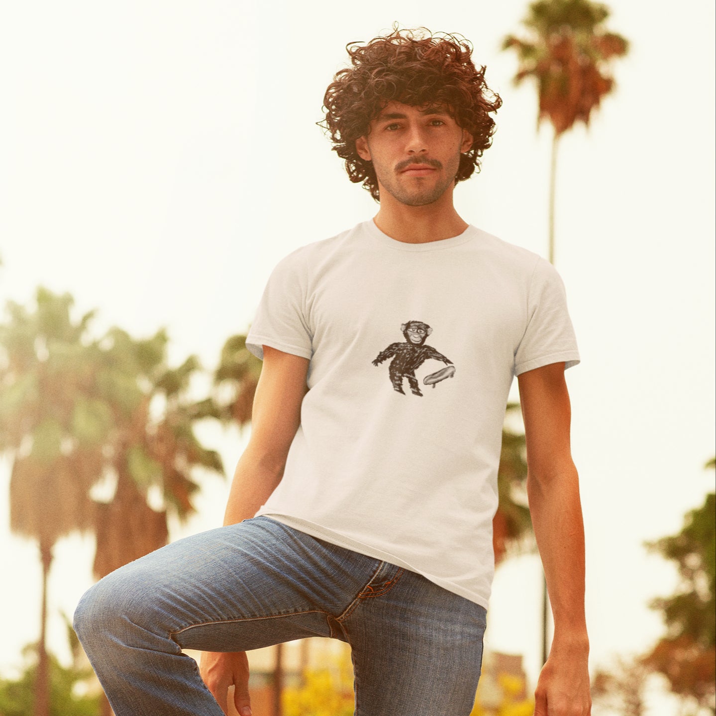 Chimp with a Skateboard | 100% Organic Cotton T Shirt worn by a man