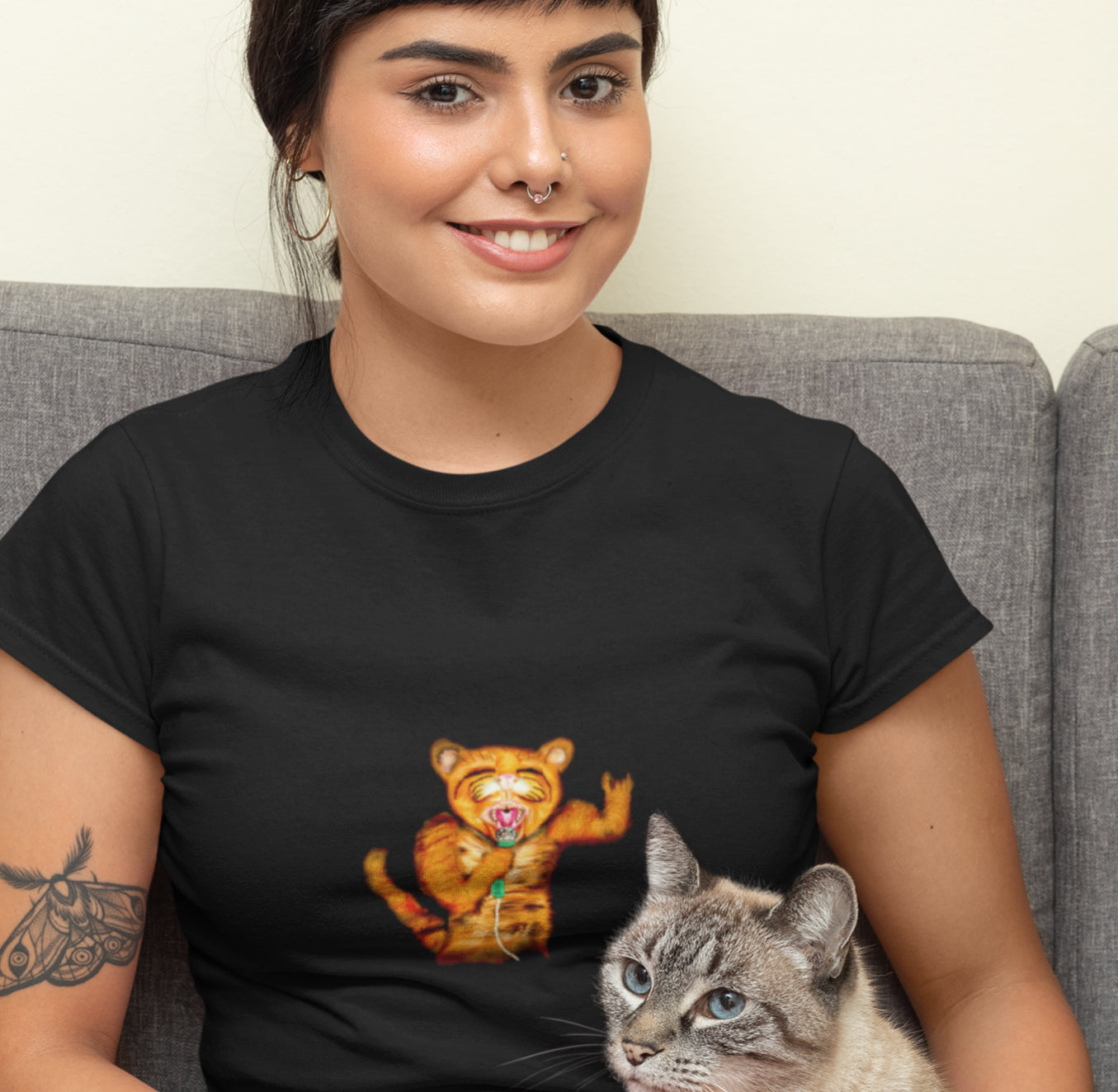 Cat Rocker | 100% Organic Cotton T Shirt worn by a woman with a cat
