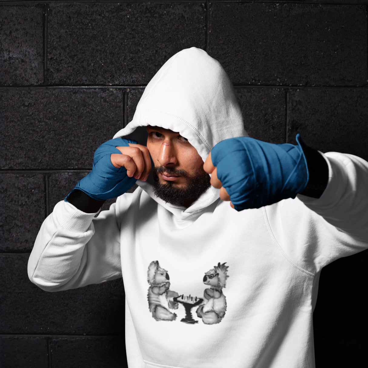 Man wearing a Koalas playing chess sustainable vegan hoodie