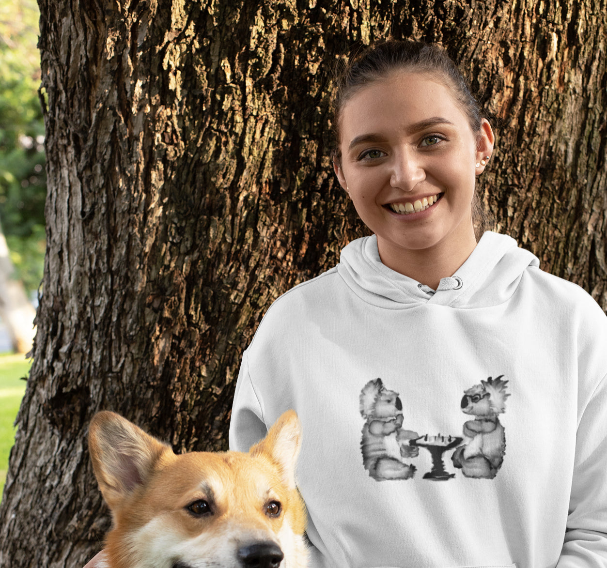 Woman wearing a Koalas playing chess sustainable vegan hoodie