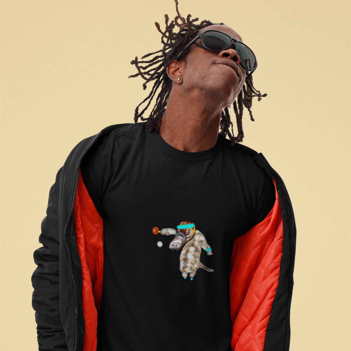 Ping Pong Platypus | 100% Organic Cotton T Shirt worn by a man with a jacket