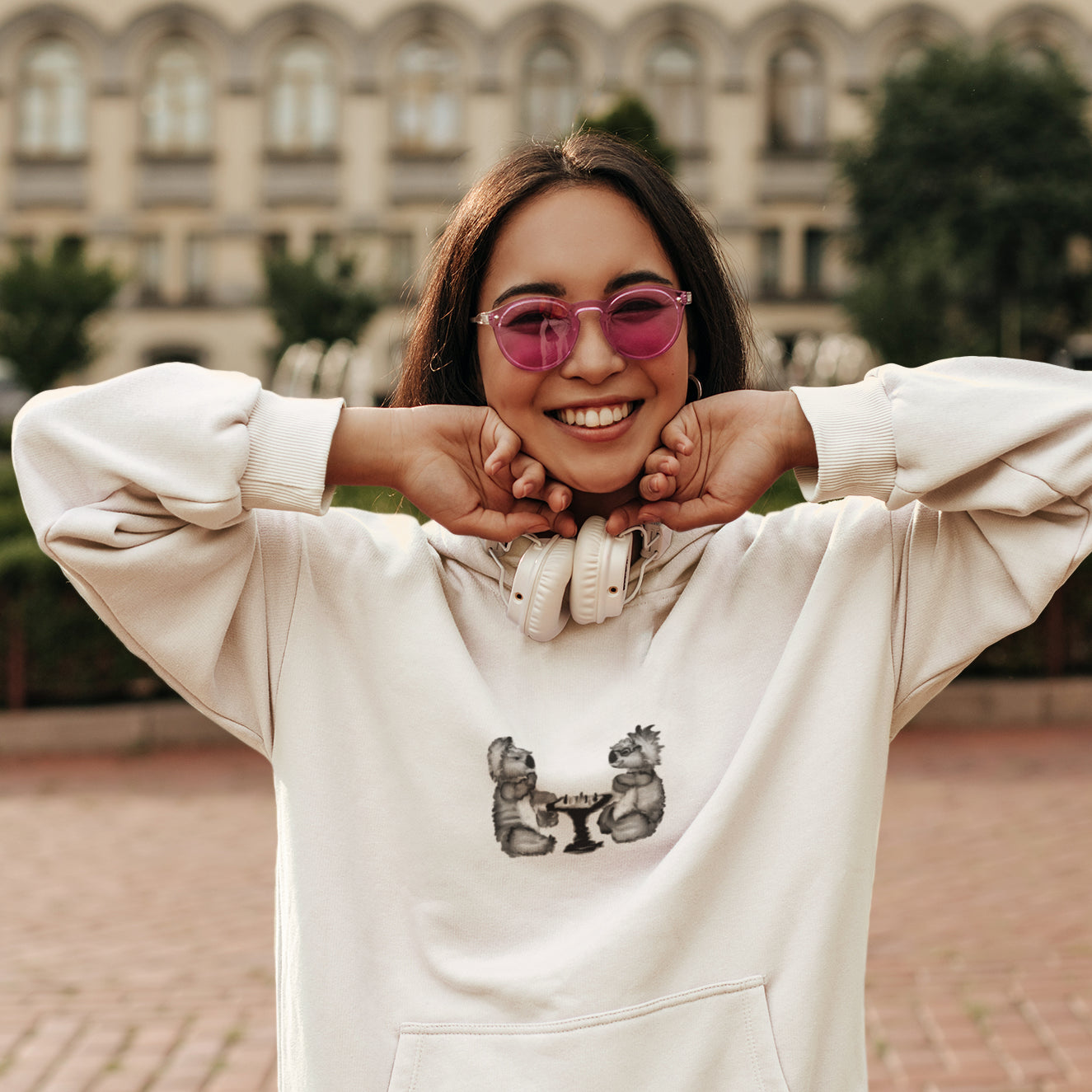 Koalas Playing Chess | Sustainable Hoodie worn by a woman