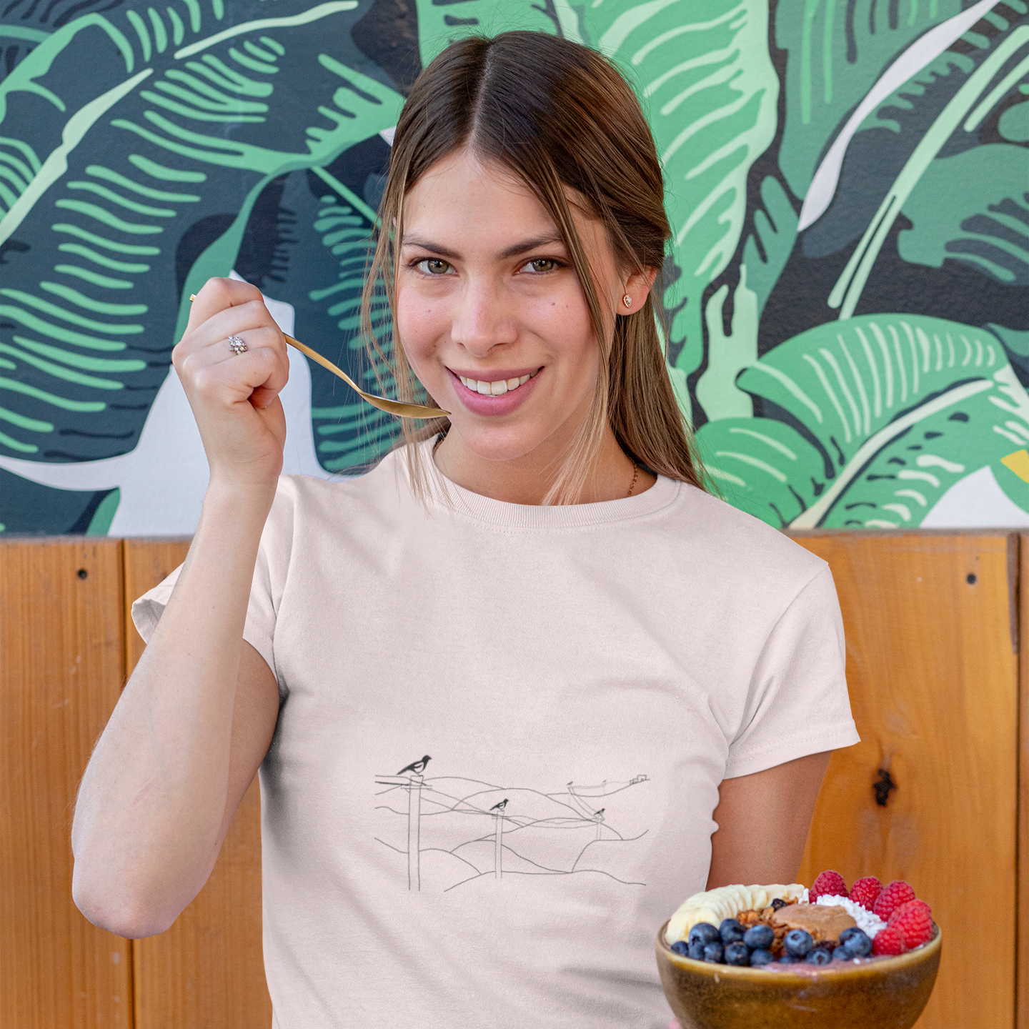 Magpies | 100% Organic Cotton T Shirt worn by a woman