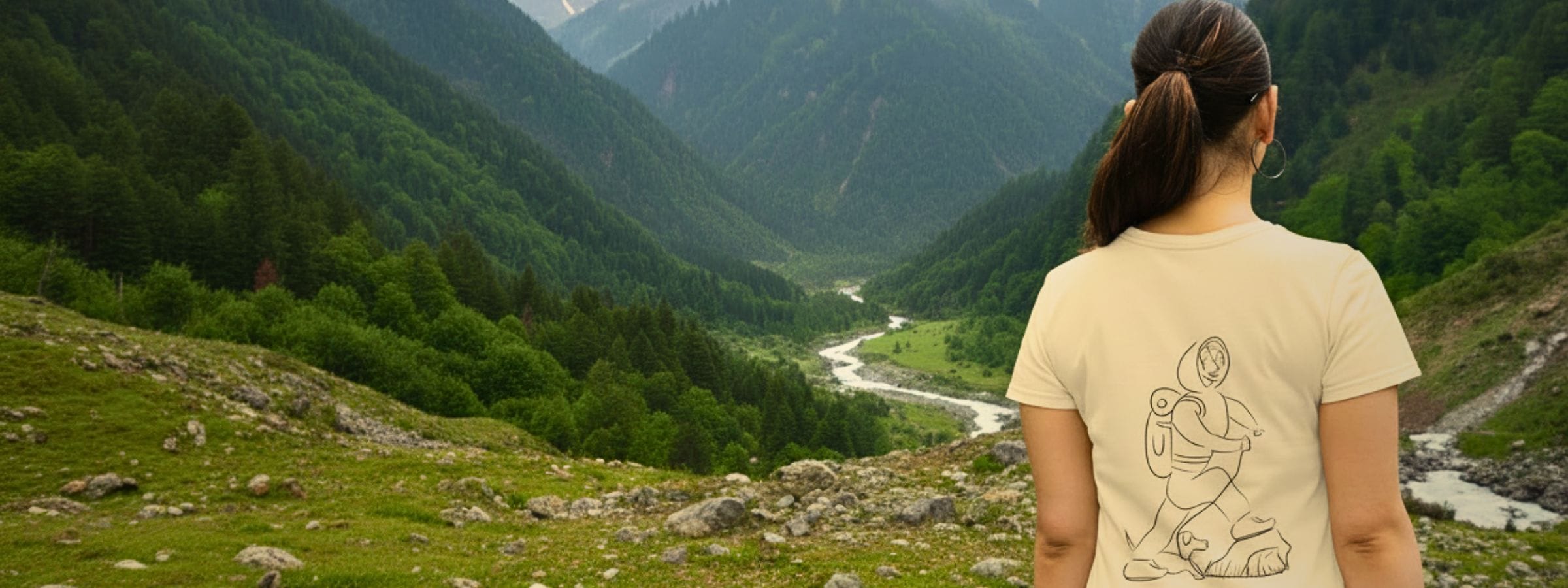 woman wearing organic cotton tee in the mountains