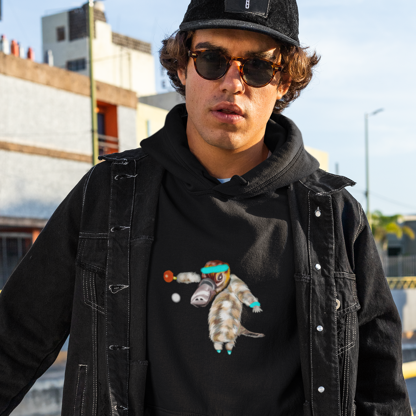 Ping Pong Platypus | Sustainable Hoodie worn by a man