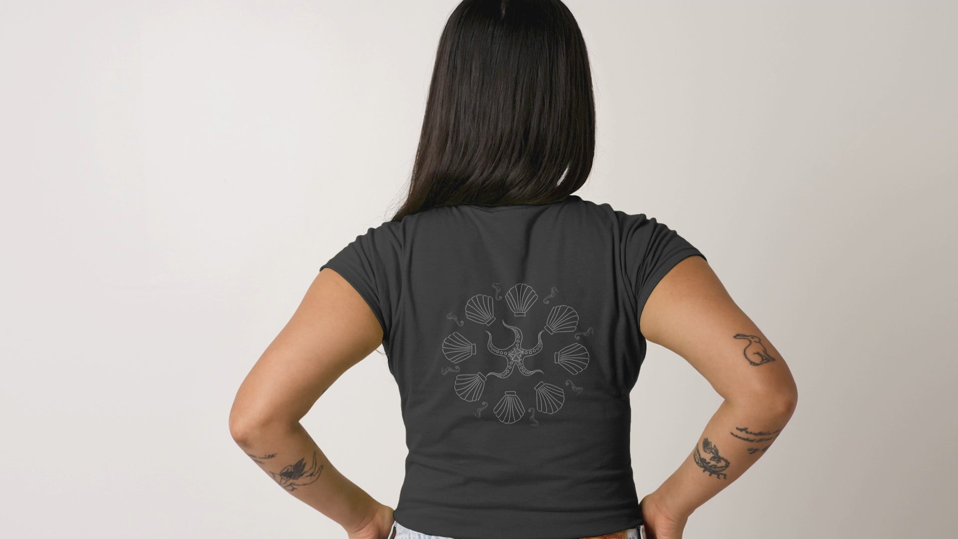 White Ocean Symphony | 100% Organic Cotton T Shirt worn by a woman