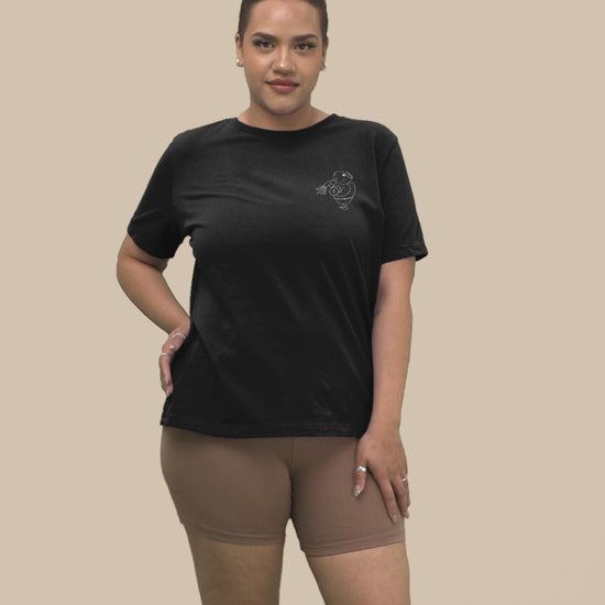 White Guinea Pig Weight Lifter | 100% Organic Cotton T Shirt in black worn by a woman