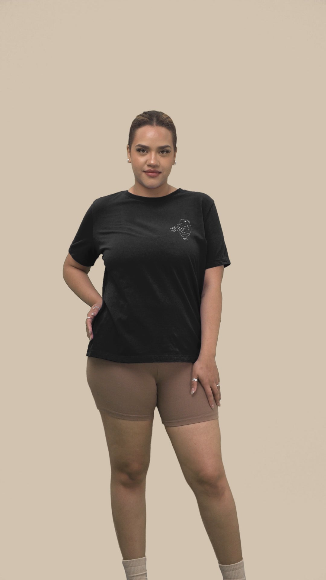 White Guinea Pig Weight Lifter | 100% Organic Cotton T Shirt in black worn by a woman