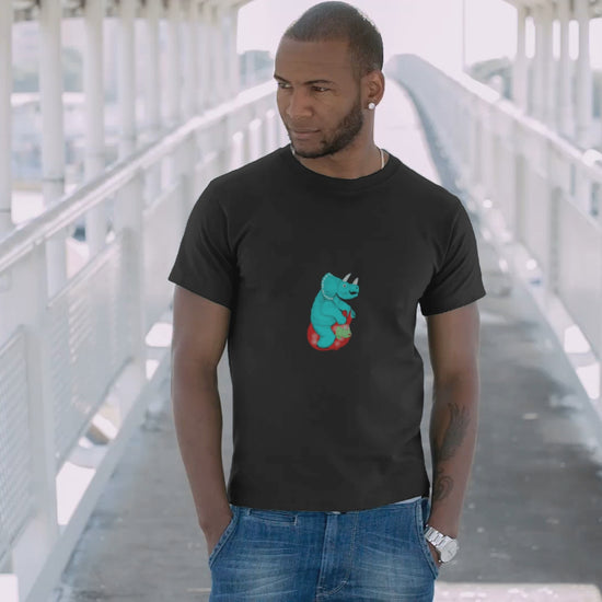 Dinosaur Space Hopper | 100% Organic Cotton T Shirt worn by a man on a bridge