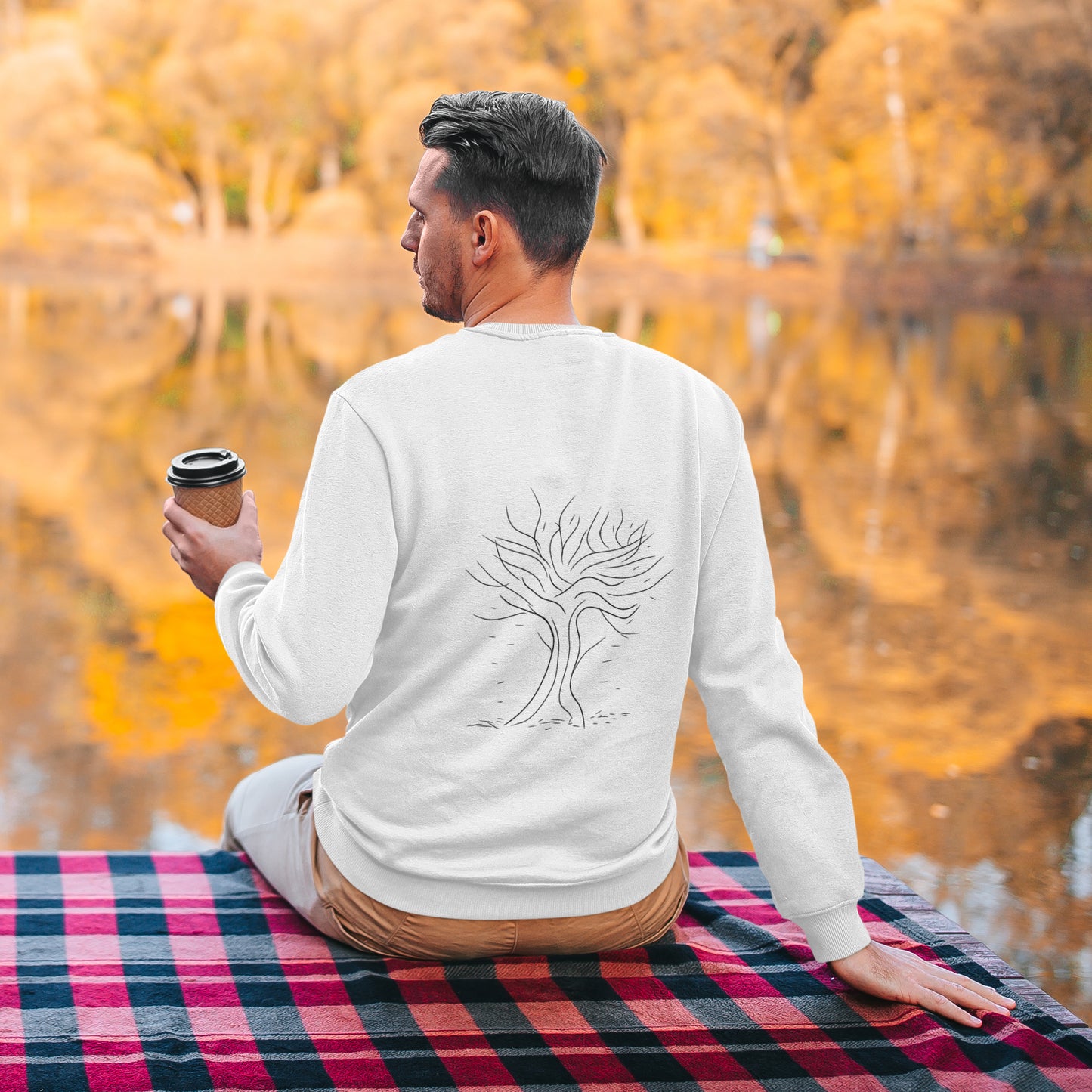 Autumn Tree Trance | Vegan Jumper worn by a man looking over a lake
