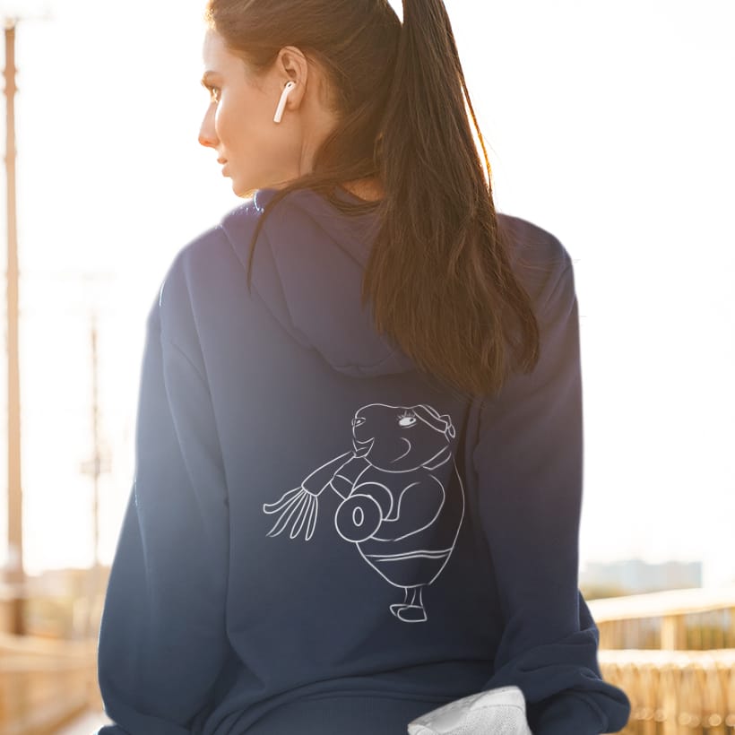White Guinea Pig Weight Lifter | Sustainable Hoodie worn by a woman