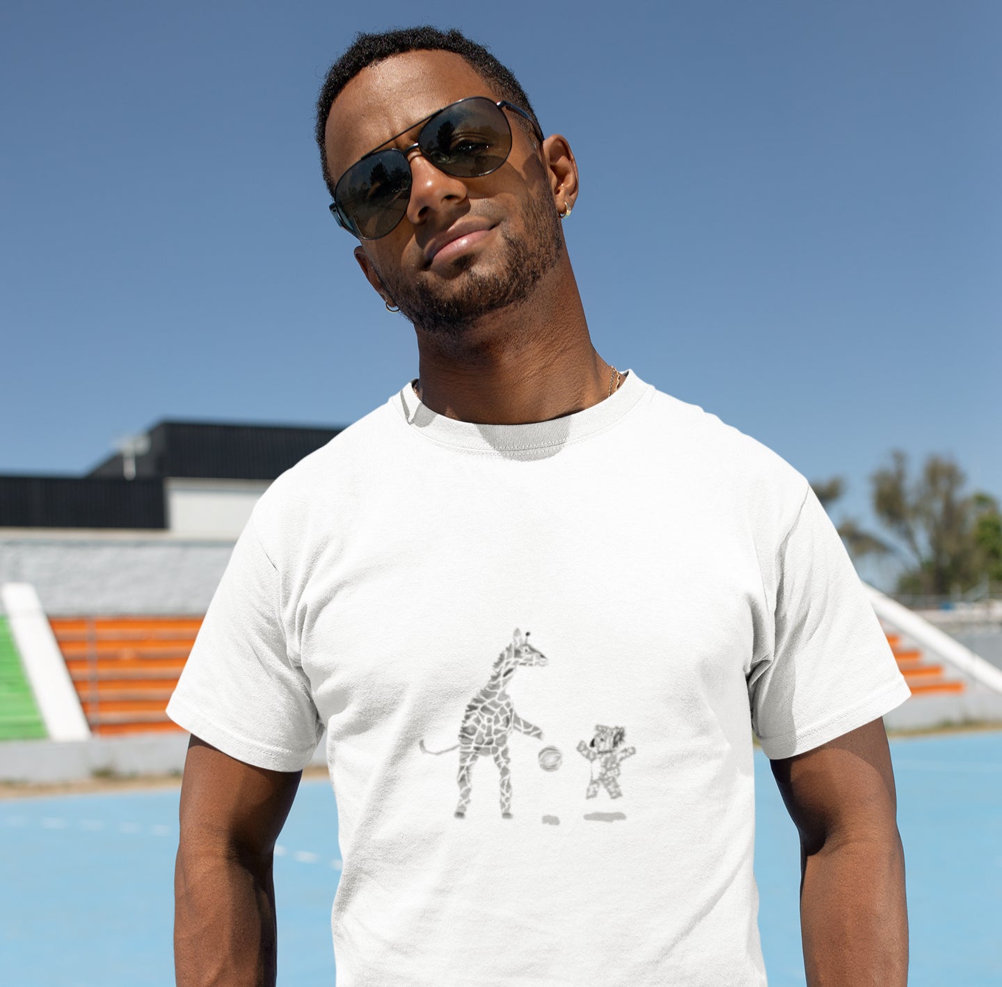 Koala Giraffe Basketball | Organic Cotton T Shirt worn by a man by a pool