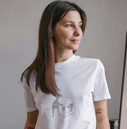 Woman wearing a Koala and giraffe playing basketball vegan organic cotton t-shirt