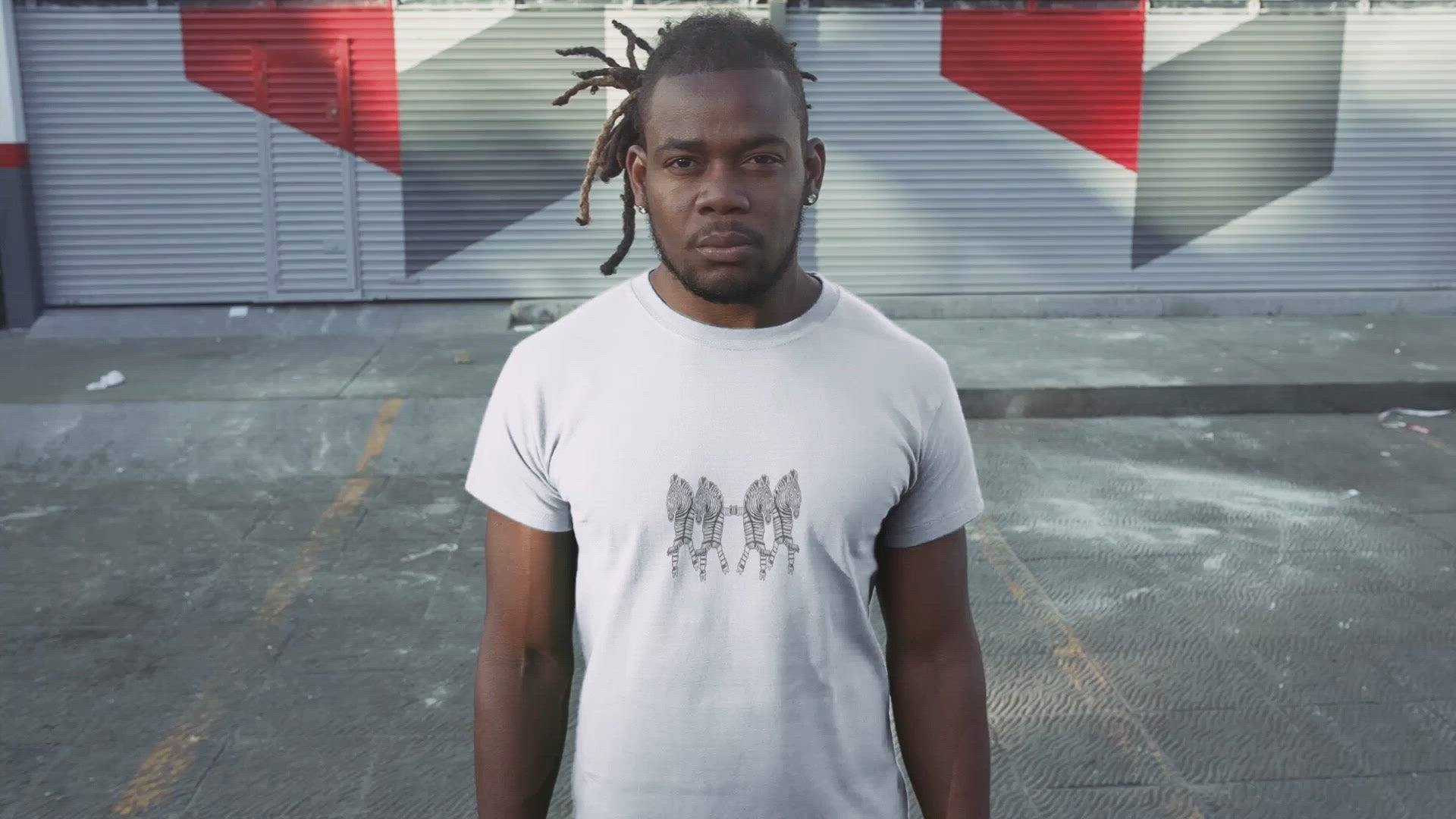 Zebra Roller Skates | 100% Organic Cotton T Shirt worn by a man on a road