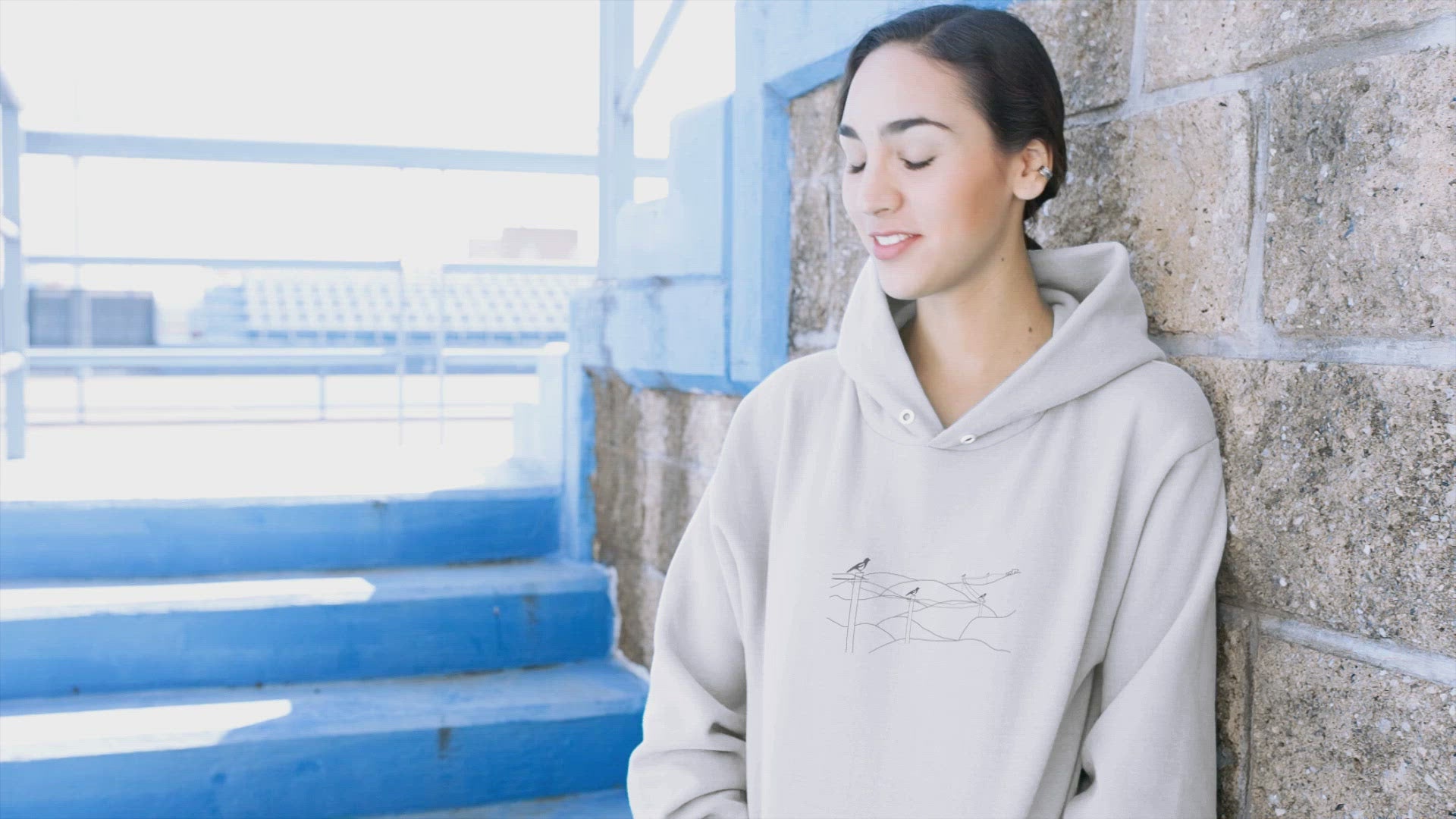 Magpies on a wire sustainable vegan hoodie
