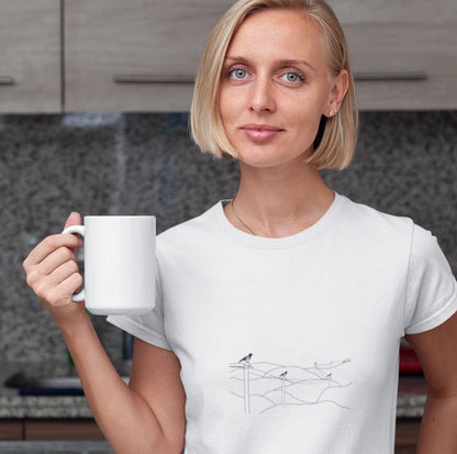 woman wearing a Magpies on a wire women's vegan organic cotton t-shirt