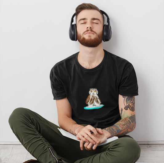 Man wearing a Owl on a surfboard vegan organic cotton t-shirt