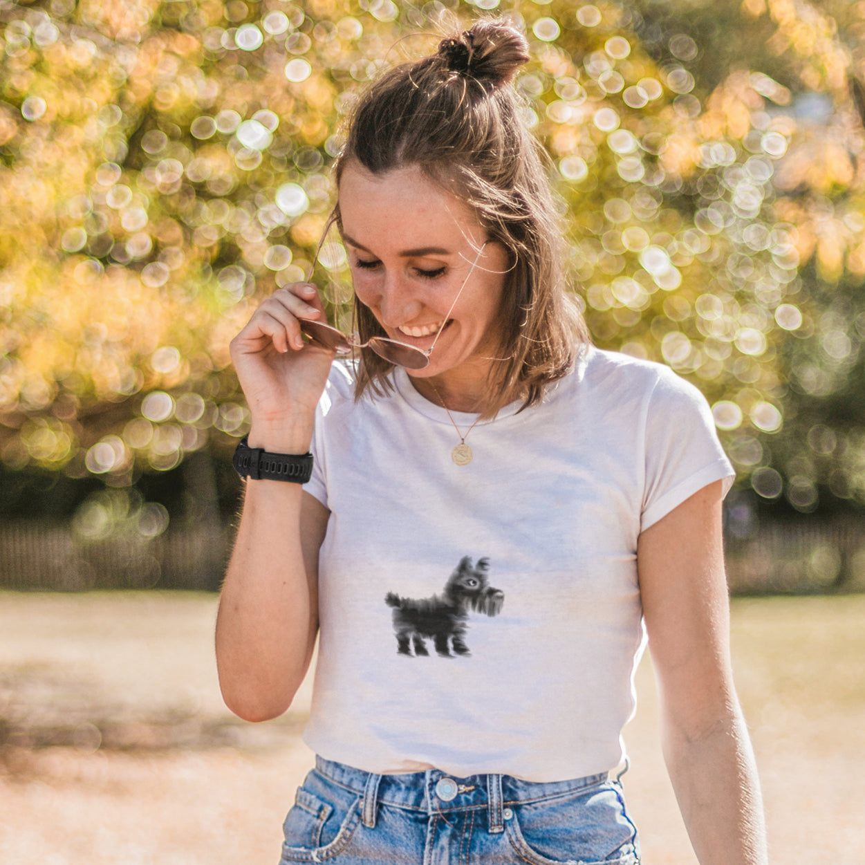 Woman wearing a Scottie dog women's vegan organic cotton t-shirt