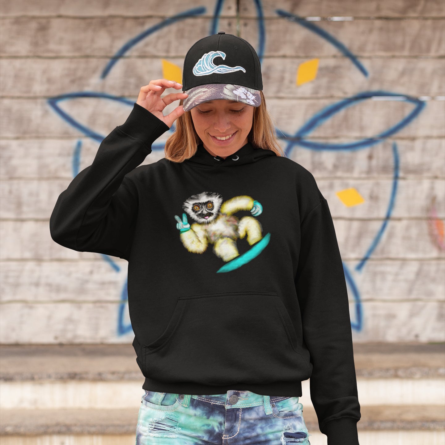 Woman wearing a Sifakas snowboarder sustainable vegan hoodie