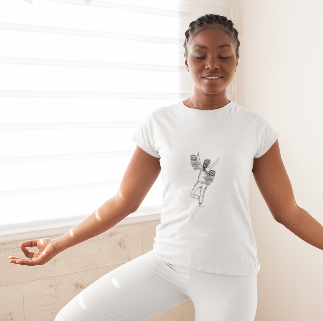 Sloth Yoga | Women's 100% Organic Cotton T Shirt worn by a woman in tree pose